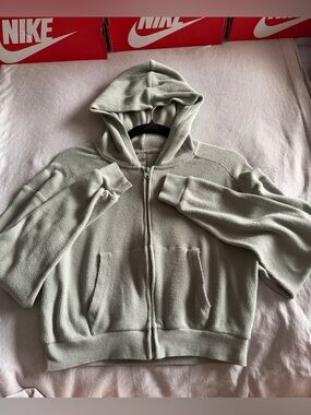 SKIMS Waffle Hoodie in a mineral green color